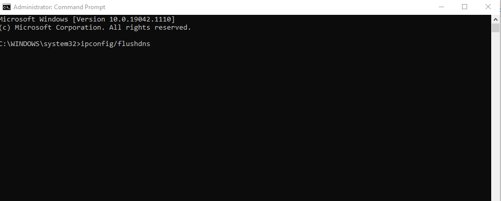 A screenshot of command prompt and the command to flush a DNS.