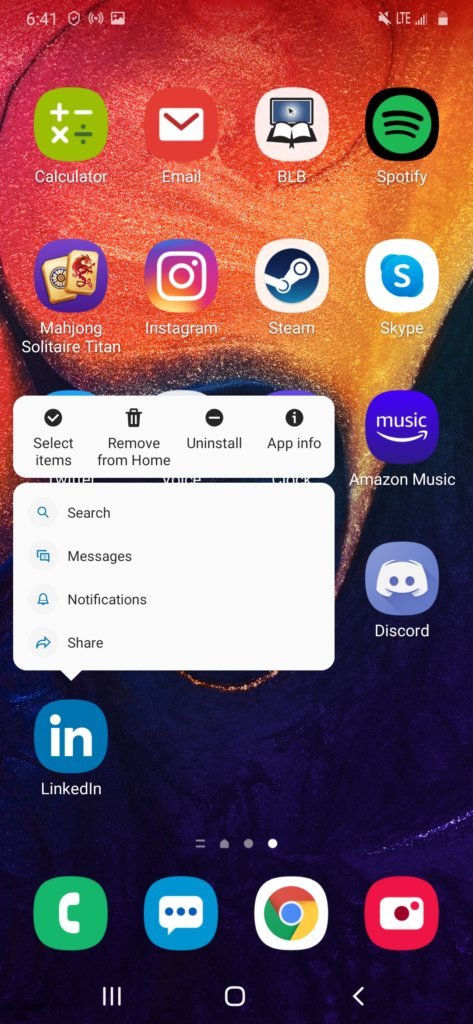A smartphone homescreen with the app settings open on an app.