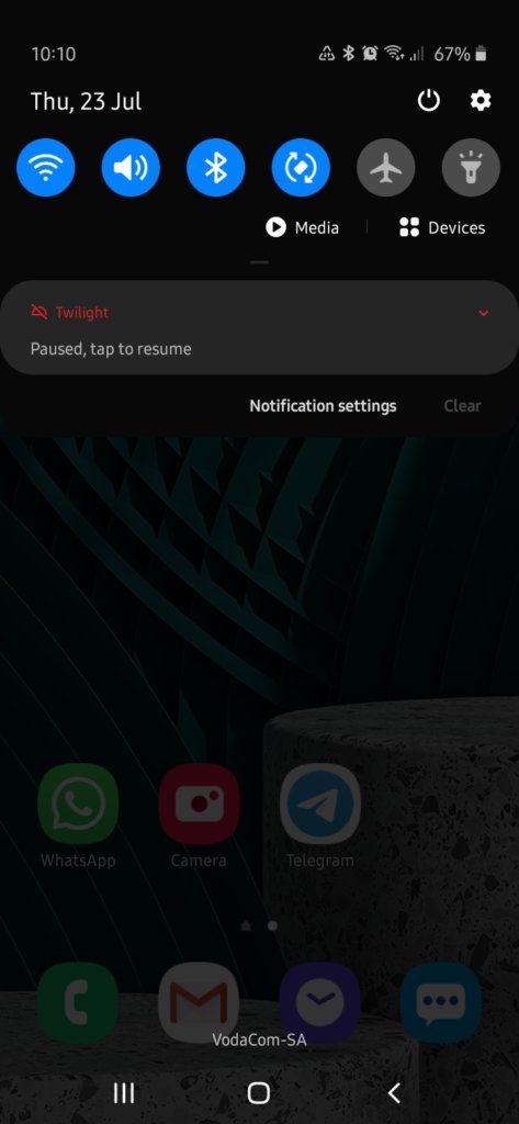 A screenshot of the phone's shortcut menu and a shortcut to settings.